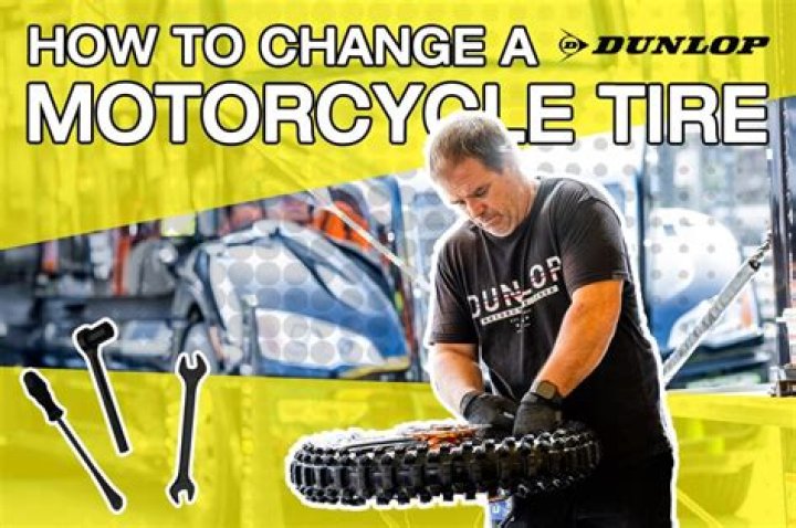 What tools do I need to change a motorcycle tire?